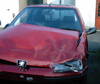 red-car-front-damage